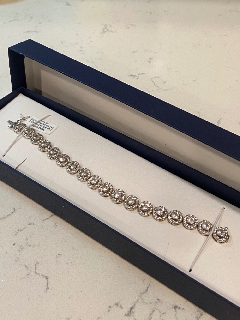 White Sapphire Halo Tennis Bracelet